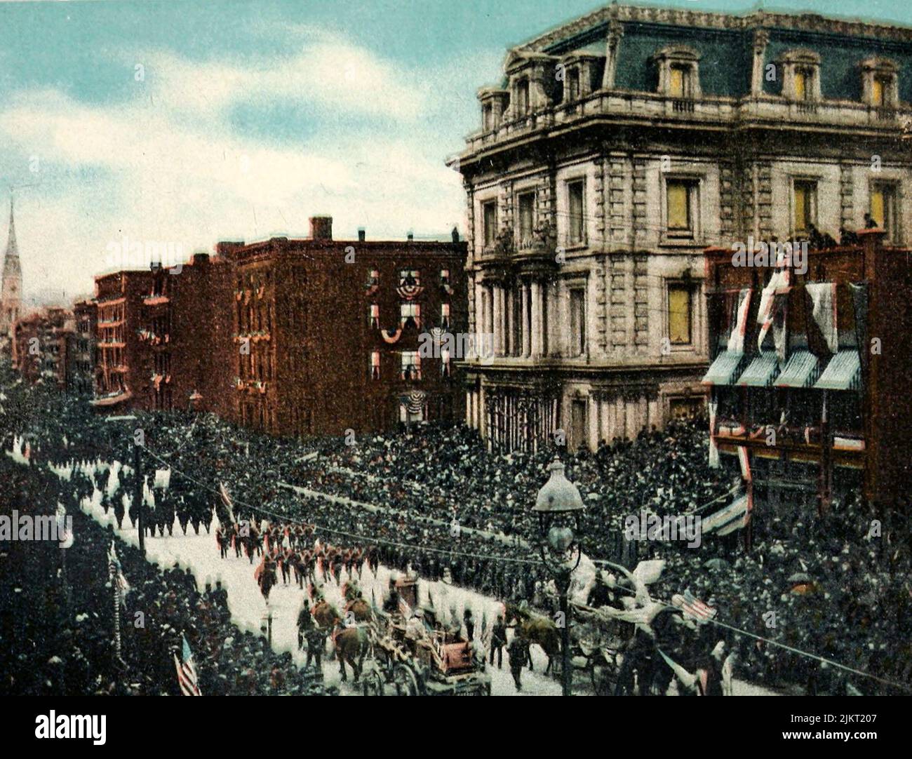 Centennial Celebration of Evacuation Day, November 25, 1883.  A view of Fifthe Avenue, south from Thirty-Fifth Street, showing the old Astor Residences, later covered by the Waldorf Astoria Hotel Stock Photo