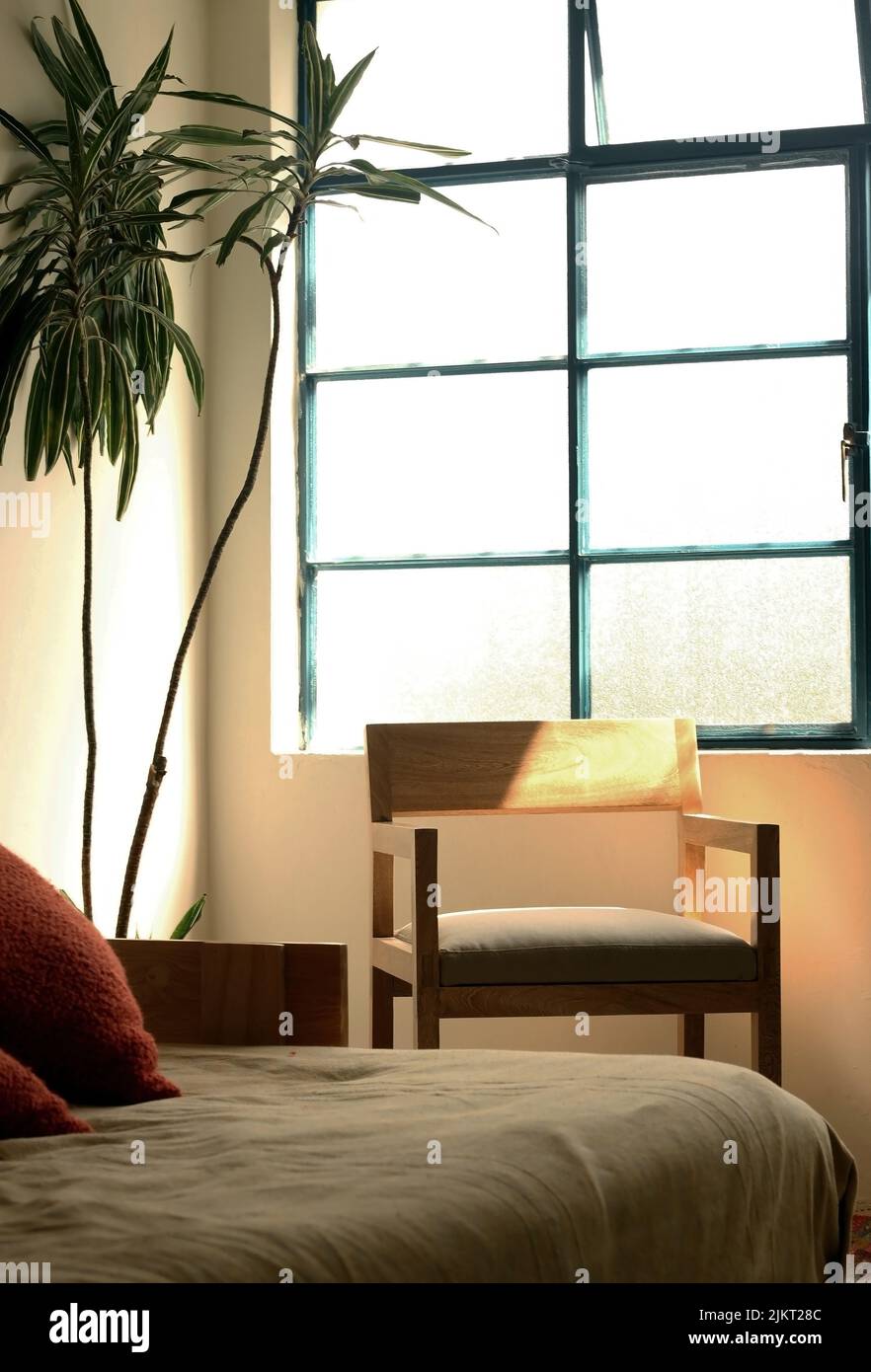 A chair modern wood frame with wooden, sunlight coming through the ...