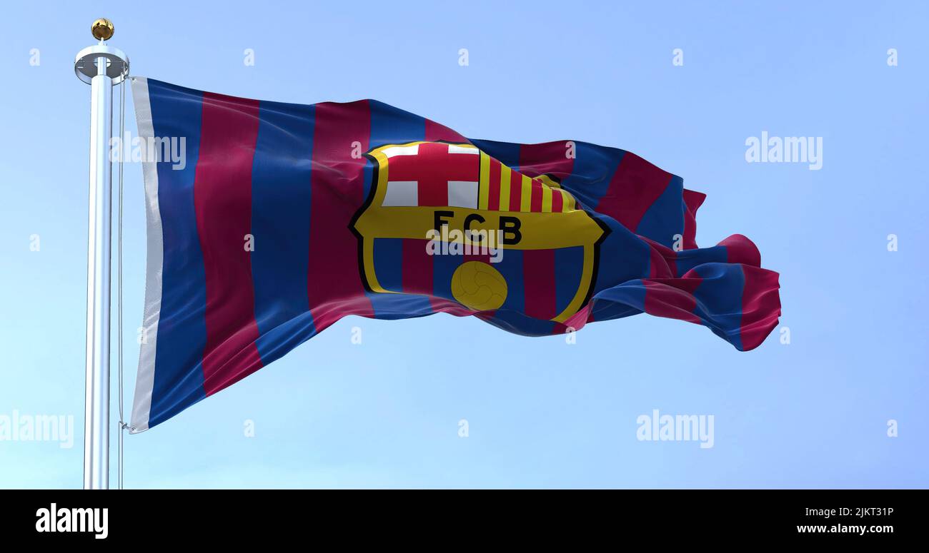 Barcelona, Spain, May 2022: The flag FC Barcelona waving in the wind on a clear day. FC Barcelona is a Spanish professional football club based in Bar Stock Photo