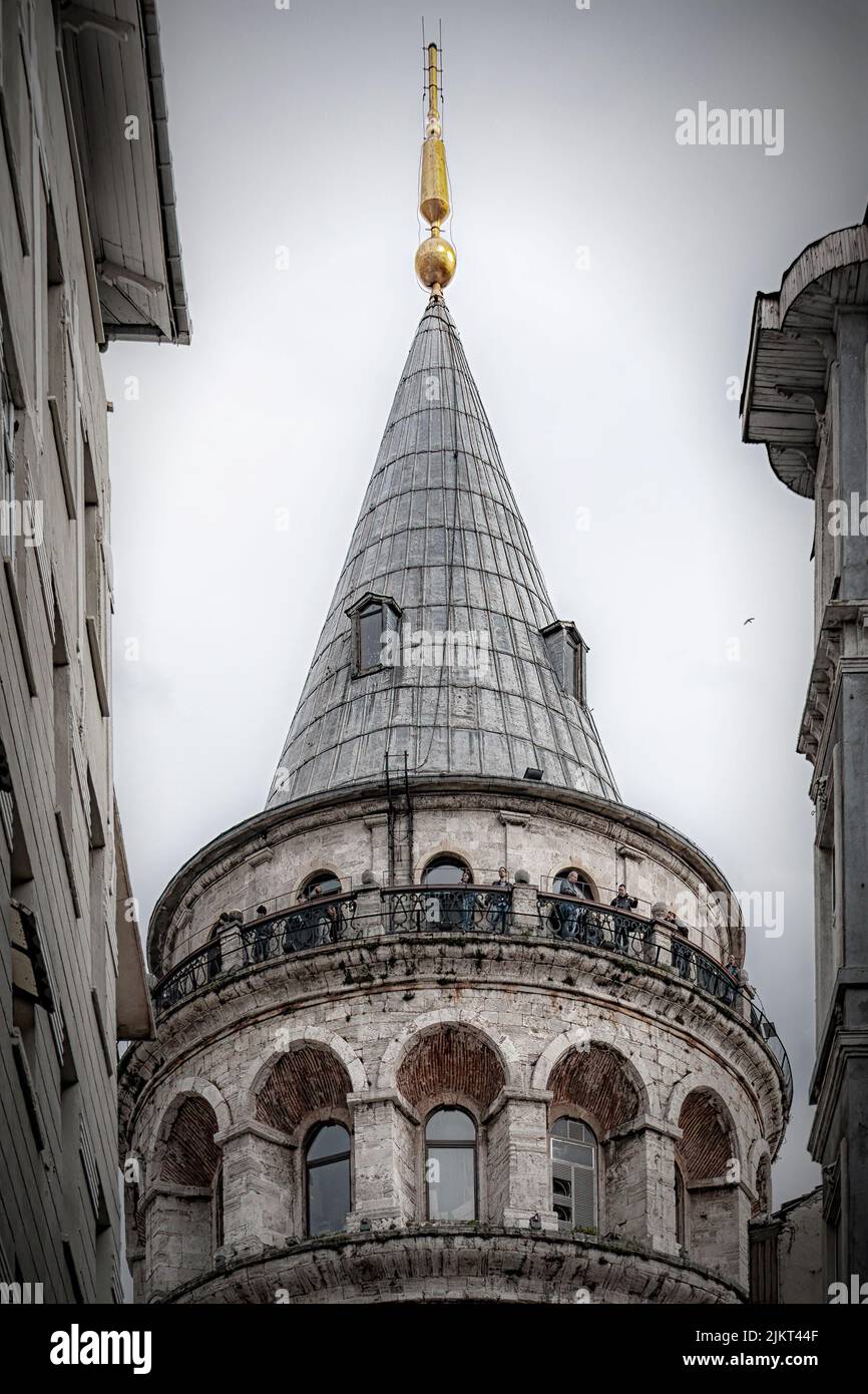 ISTANBUL, TURKEY - APRIL 09 2011: The Galata tower dominates the skyline of the region. Stock Photo