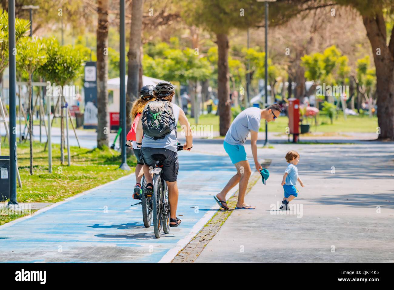 04 June 2022, Antalya, Turkey: The child ran out onto the bike path and created a dangerous and emergency situation Stock Photo