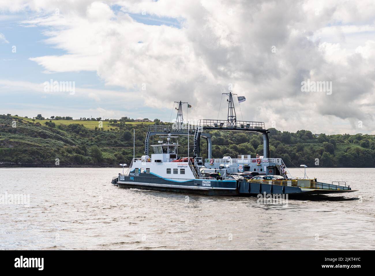 Ballyhack, Co. Wexford, Ireland. 3rd Aug, 2022. The Ballyhack to Passage East car ferry was doing great business on a sunny, but windy day today. The ferry crossing saves around 30 minutes travel time by road. Credit: AG News/Alamy Live News Stock Photo