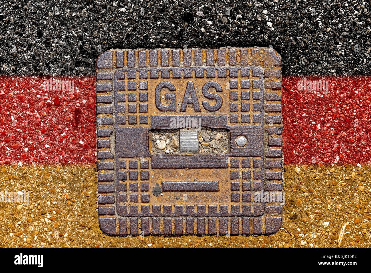 Cover Of A Gas Pipeline, Manhole Cover With Inscription Gas, Germany Flag On Street PHOTO MOUNTING Stock Photo