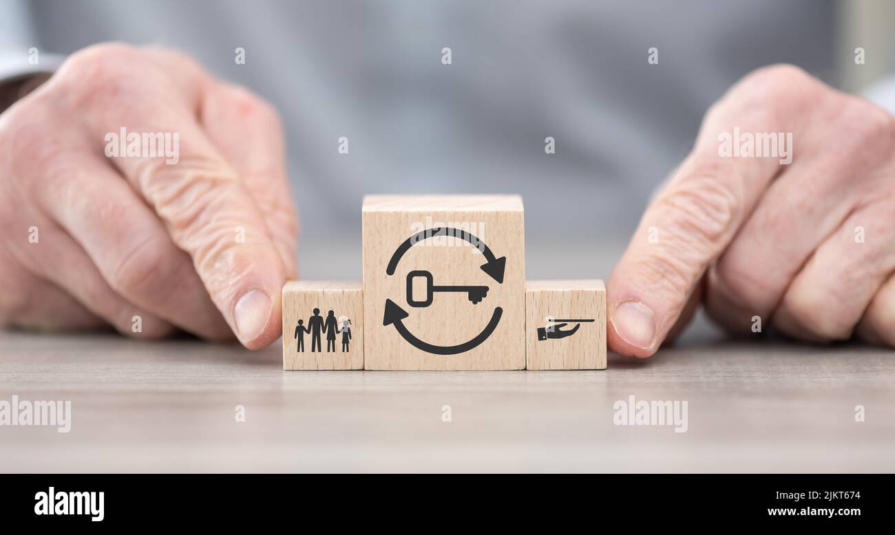 Wooden blocks with symbol of legacy concept Stock Photo - Alamy