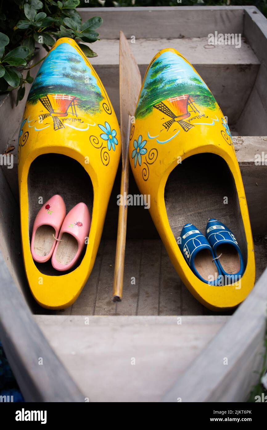 Dutch clogs design. Clogs are a type of footwear made in part or completely from wood. Stock Photo