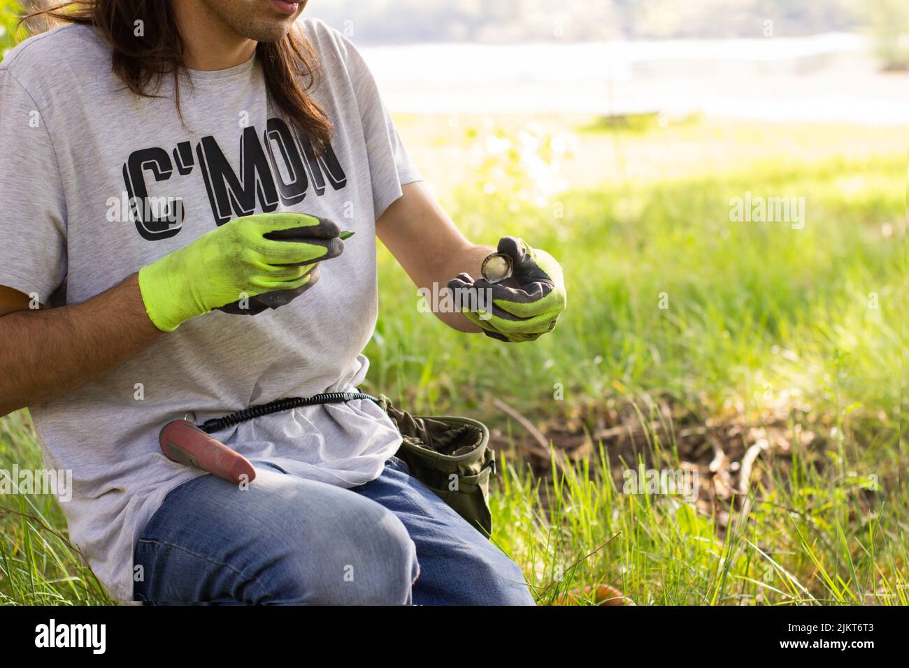 Metal detecting in the park hi-res stock photography and images - Alamy