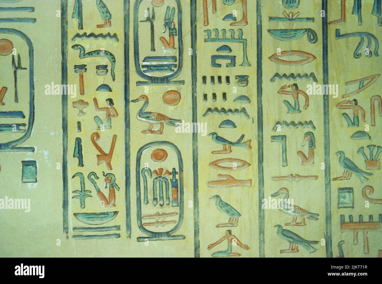 Frescoes showing hieroglyphes on the interior wall of Queen Amenherkhepshefs tomb in the Valley of the Queens, near Luxor, Egypt. Stock Photo