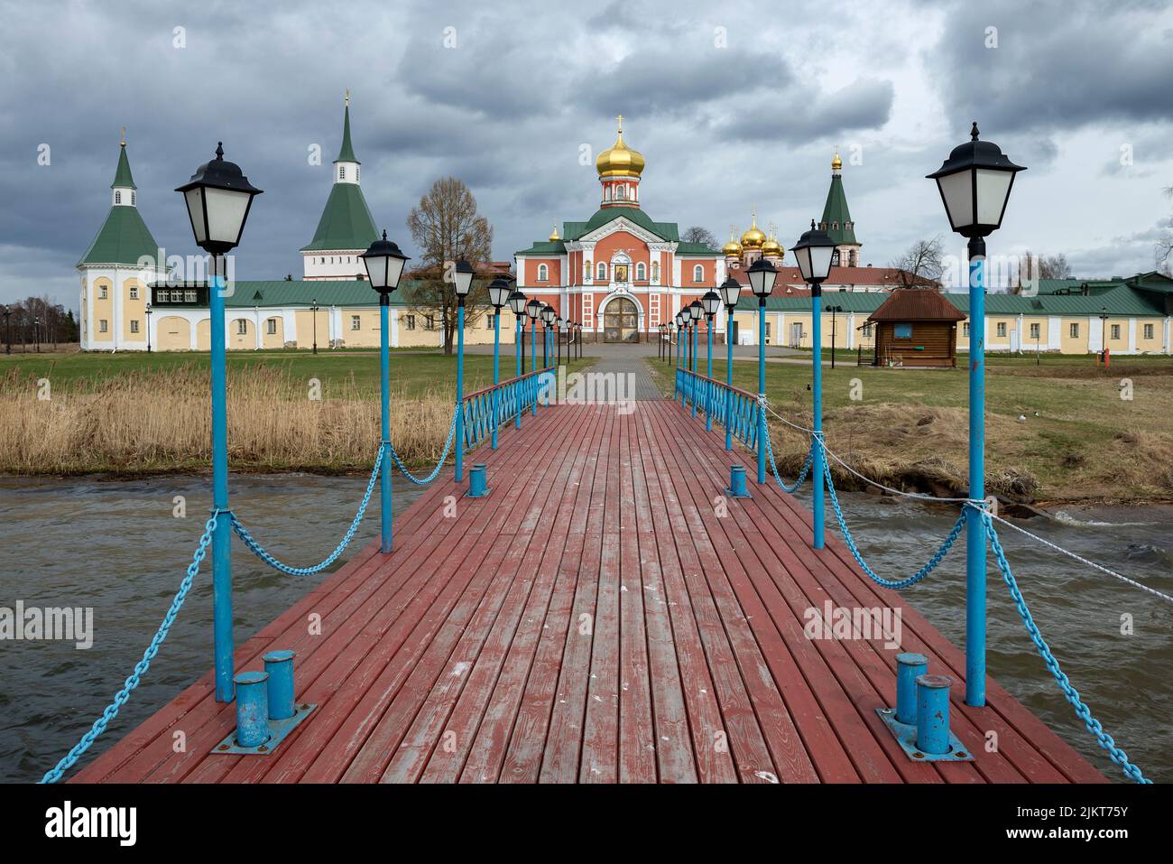View of the Valdai Iversky Svyatoozersky Monastery in the gloomy April afternoon. Novgorod region, Russia Stock Photo