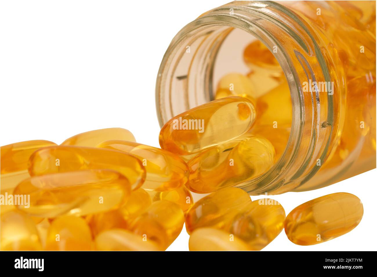 Fish oil, omega 3 and vitamin D capsules in glass bottle on a white