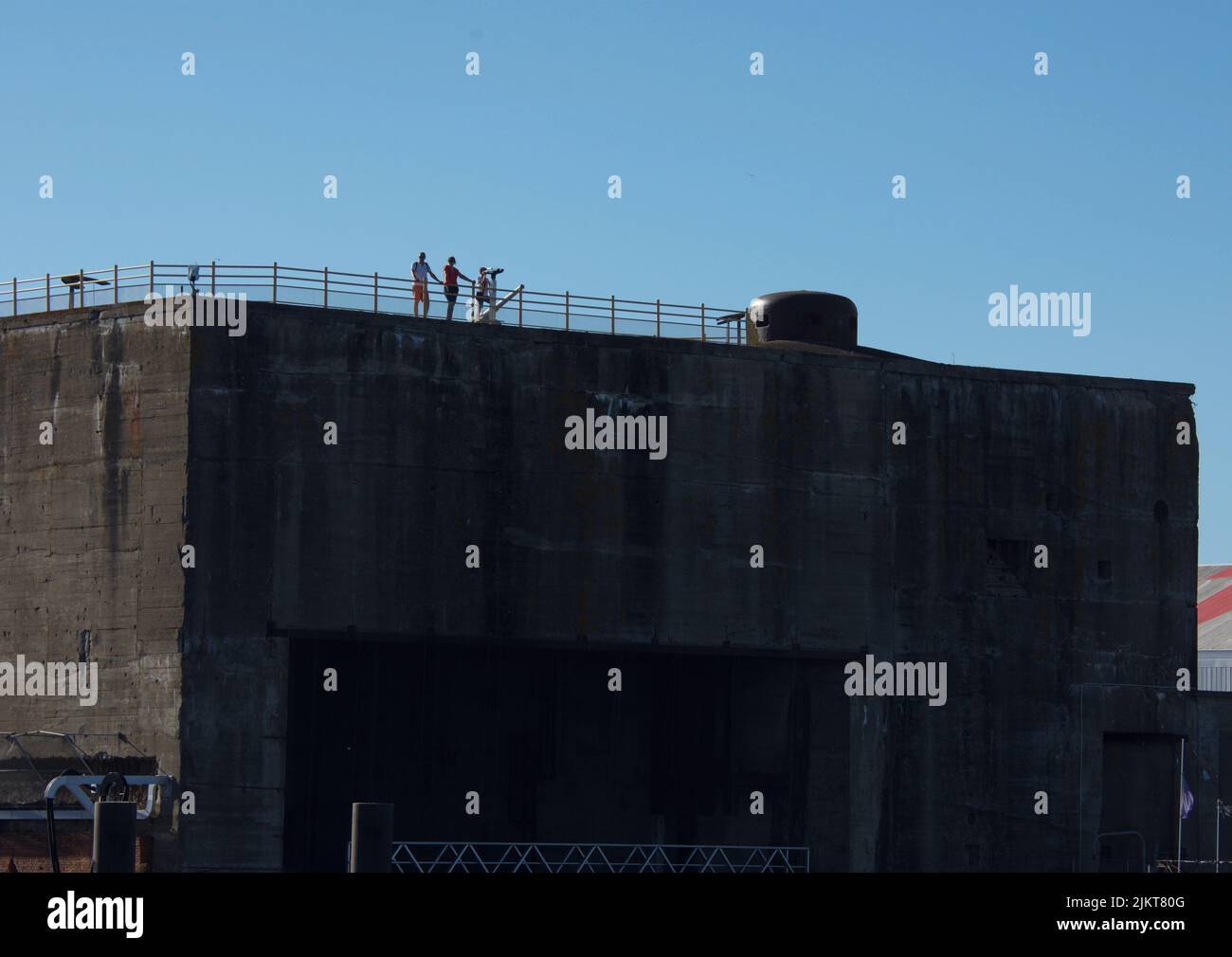 People watch from the top of a blaukaus in Saint-Nazaire. Estuary of the Loire river, France. Stock Photo