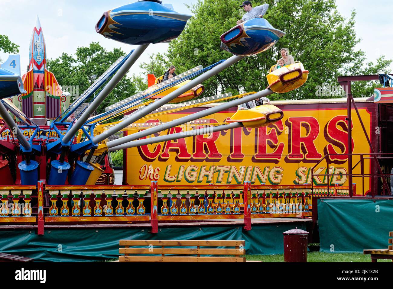 The traditional and colourful Carters Steam Fair being enjoyed by crowds on a summers day in Surrey England UK Stock Photo