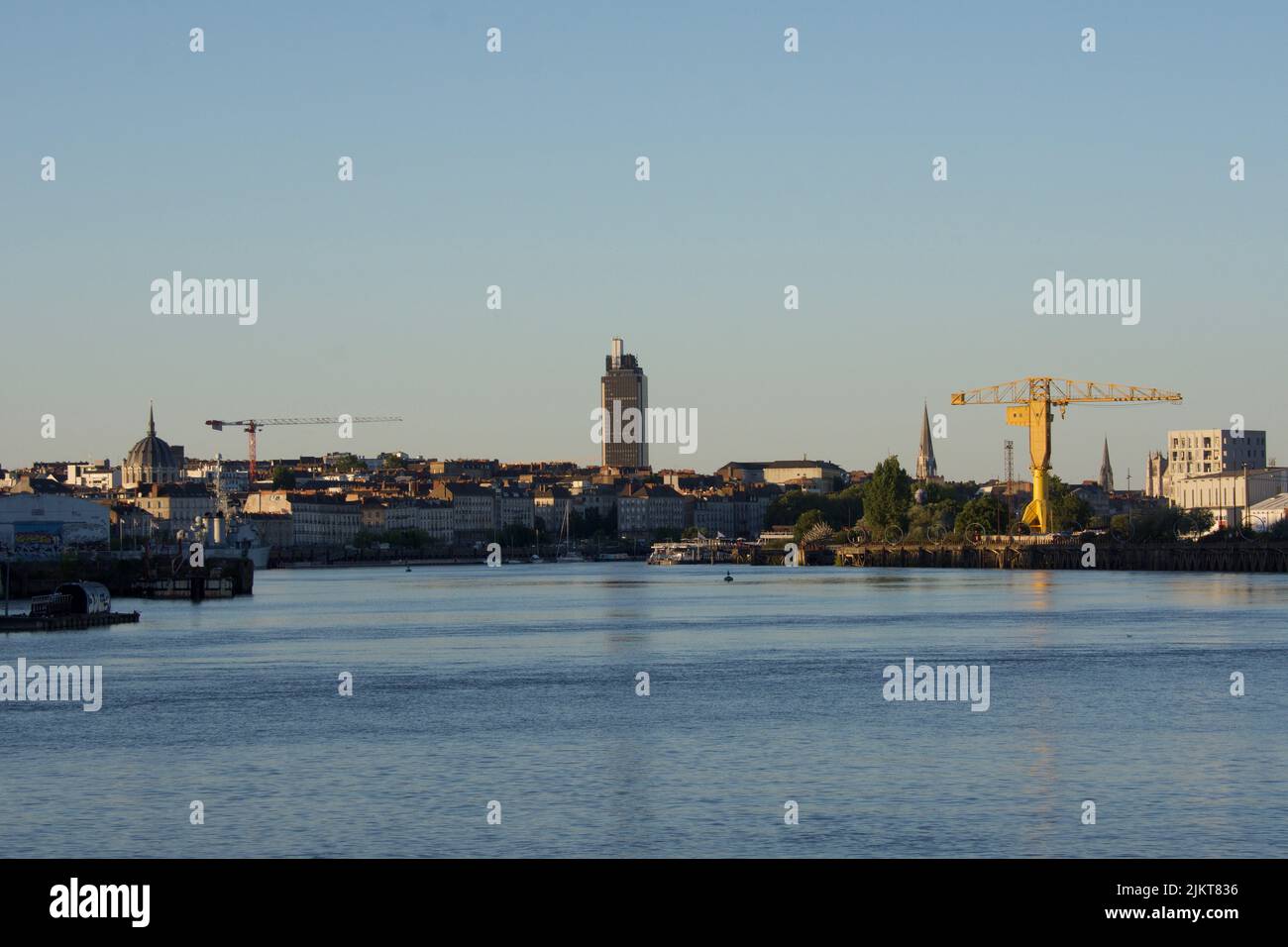 The port of nantes on the evening estuary of loire hires stock
