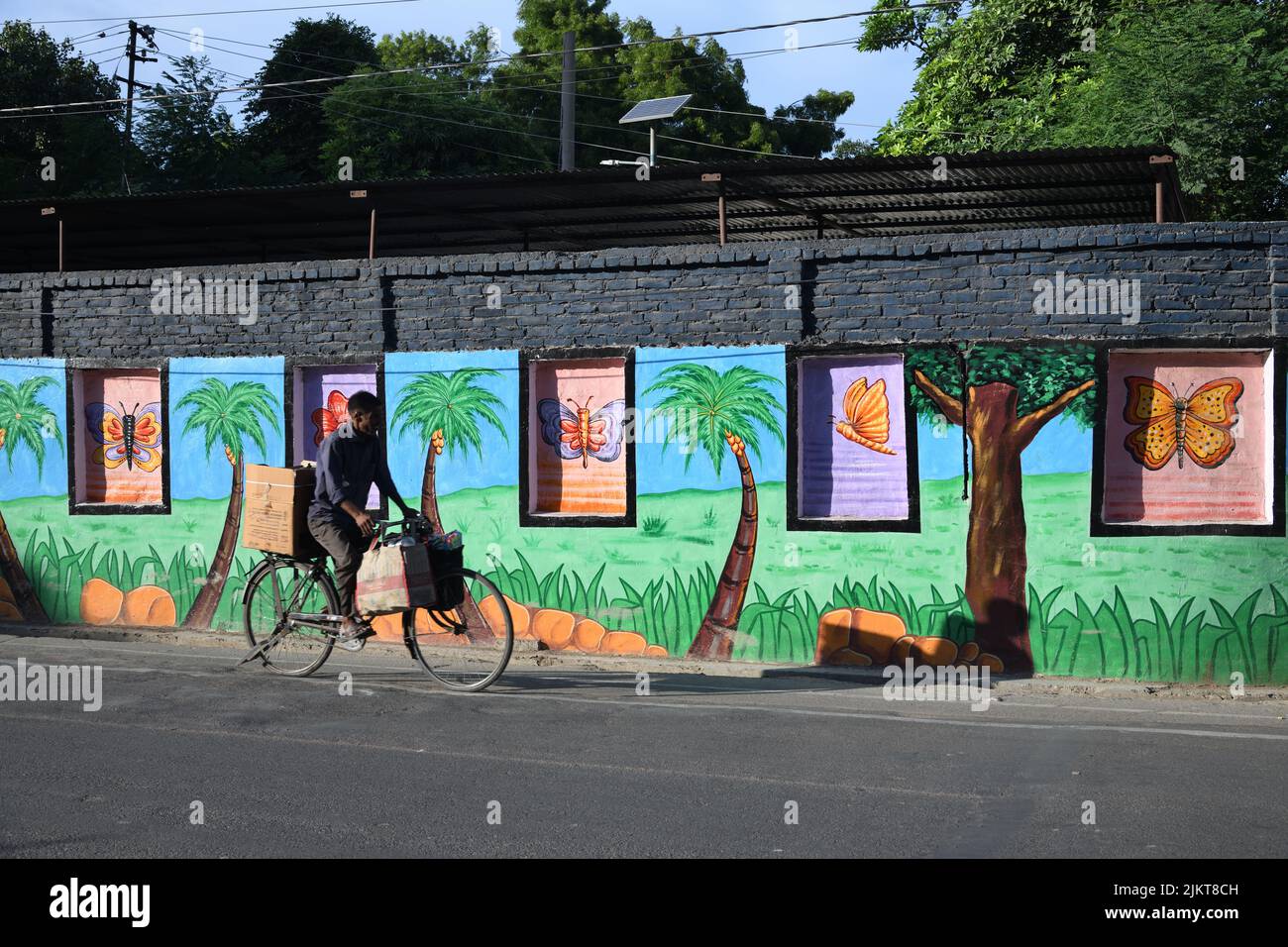 Wall paintings on the Canal road. Kanpur. Uttar Pradesh, India Stock