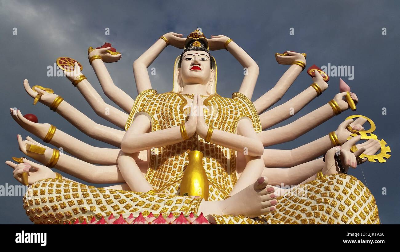The Big Statue of Shiva many hands in Wat Plai Laem Temple on Koh Samui island in Thailand Stock Photo