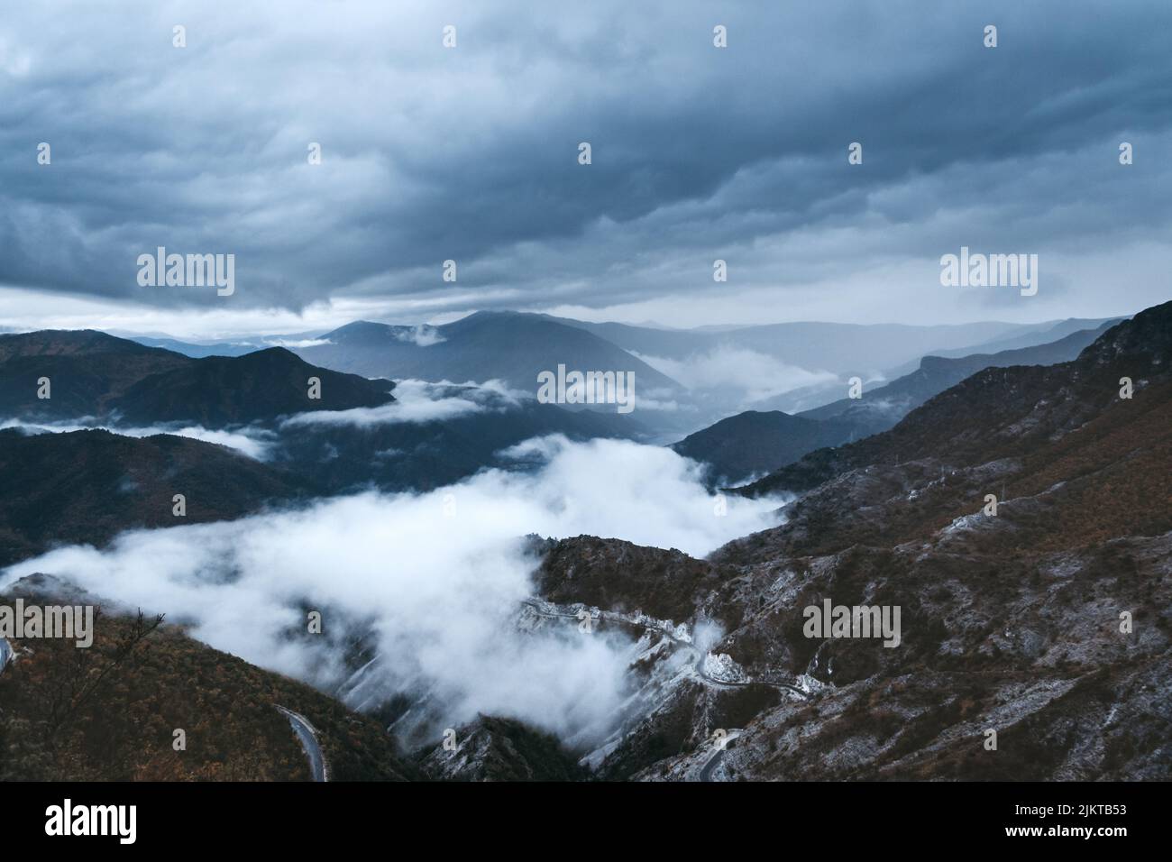 Beautiful landscape mountains clouds hi-res stock photography and ...
