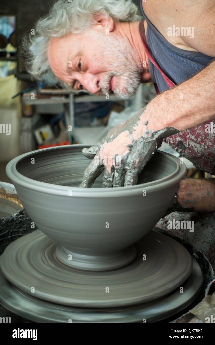 potter at work, St. Quentin La Poterie, France. Stock Photo