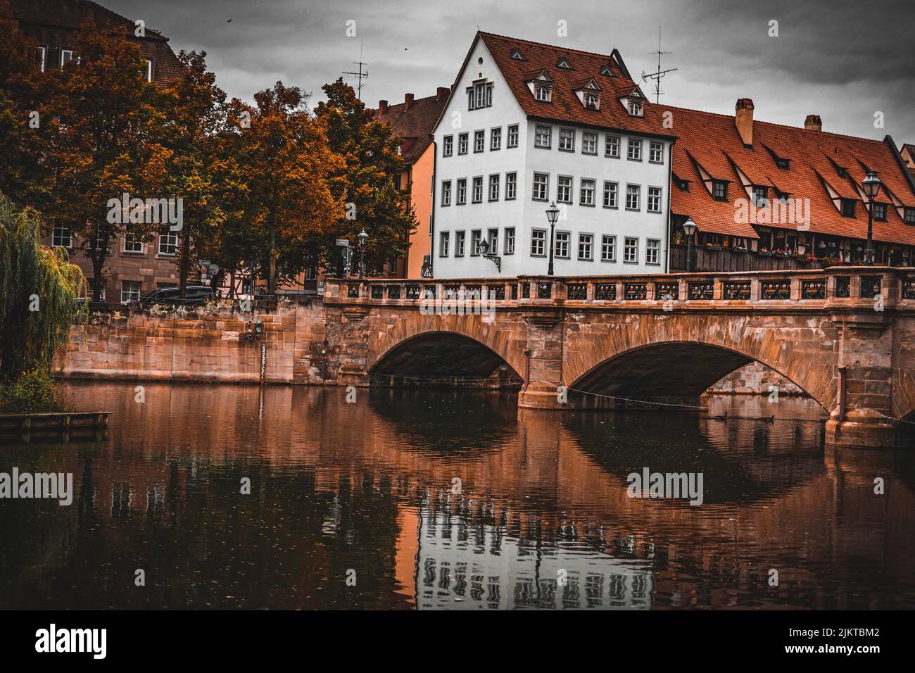 A beautiful view of a bridge and apartment buildings in Nuremberg Stock Photo