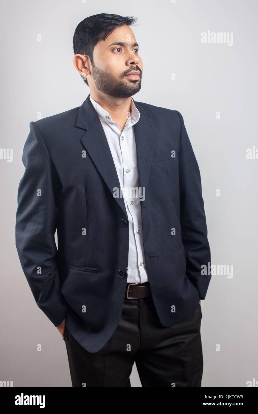 Indian man standing grey hi-res stock photography and images - Alamy