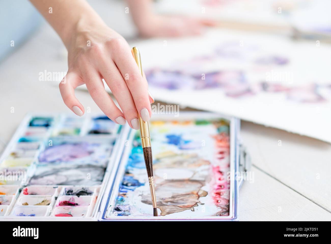 art painting class hobby hand mixing watercolors Stock Photo Alamy