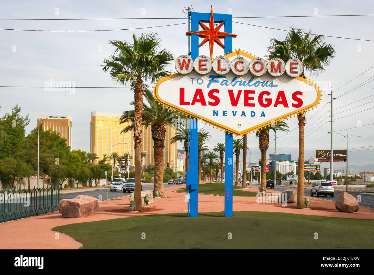 A closeup of the sign to Fabulous Las Vegas" between the roads