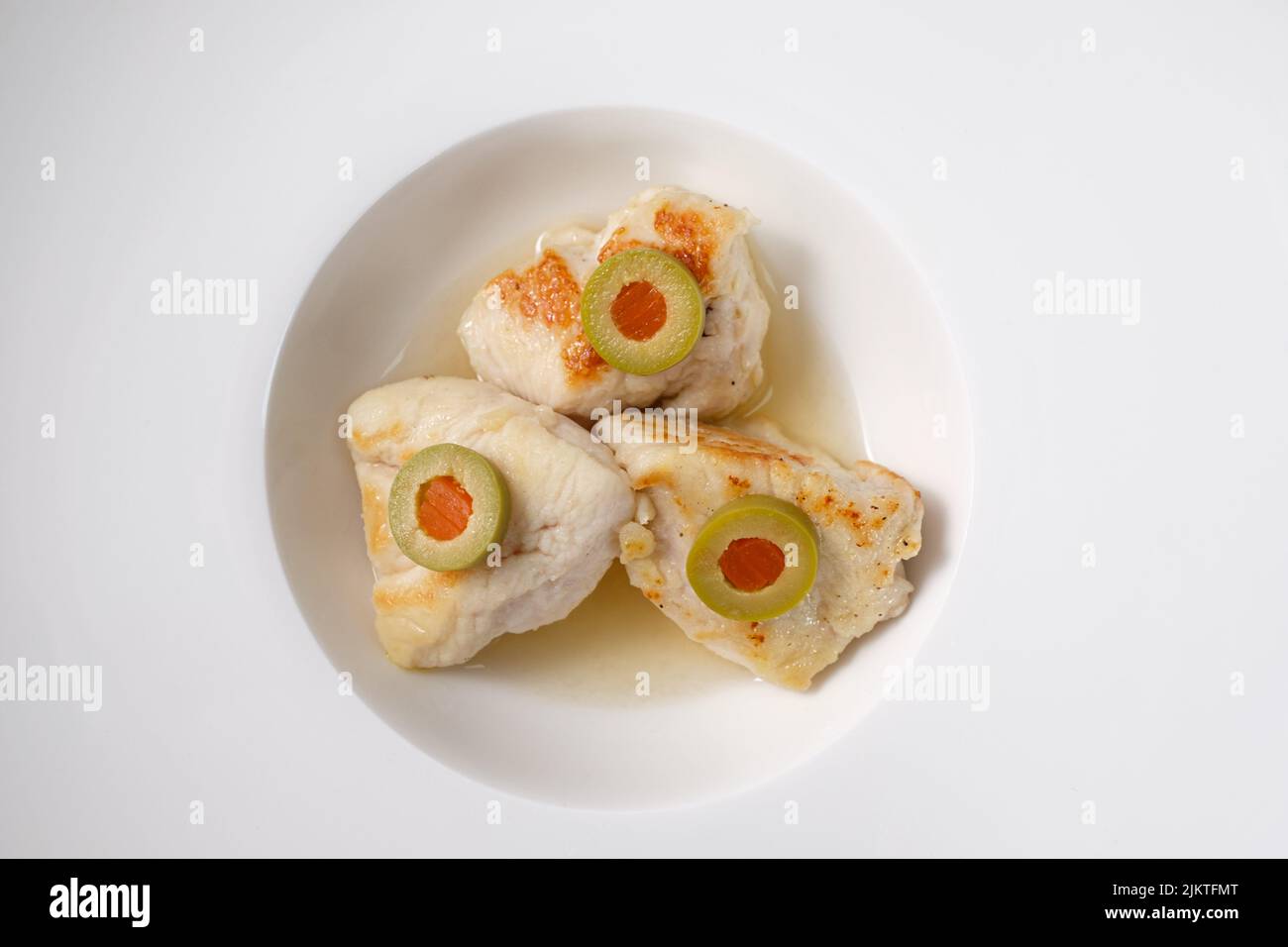 Roasted chicken meat with olive and sherry sauce Stock Photo Alamy