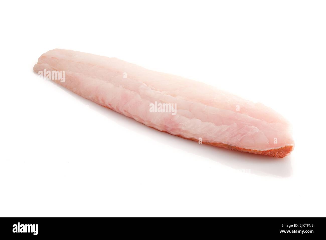 Redfish filet close-up on white isolated Stock Photo - Alamy