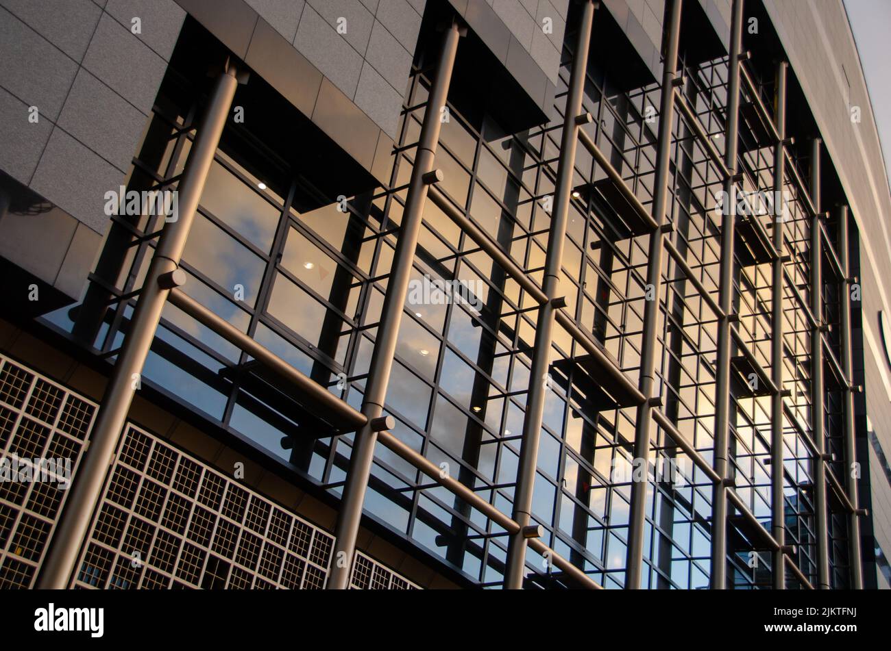 A modern glass wall pattern with metal constructions Stock Photo Alamy