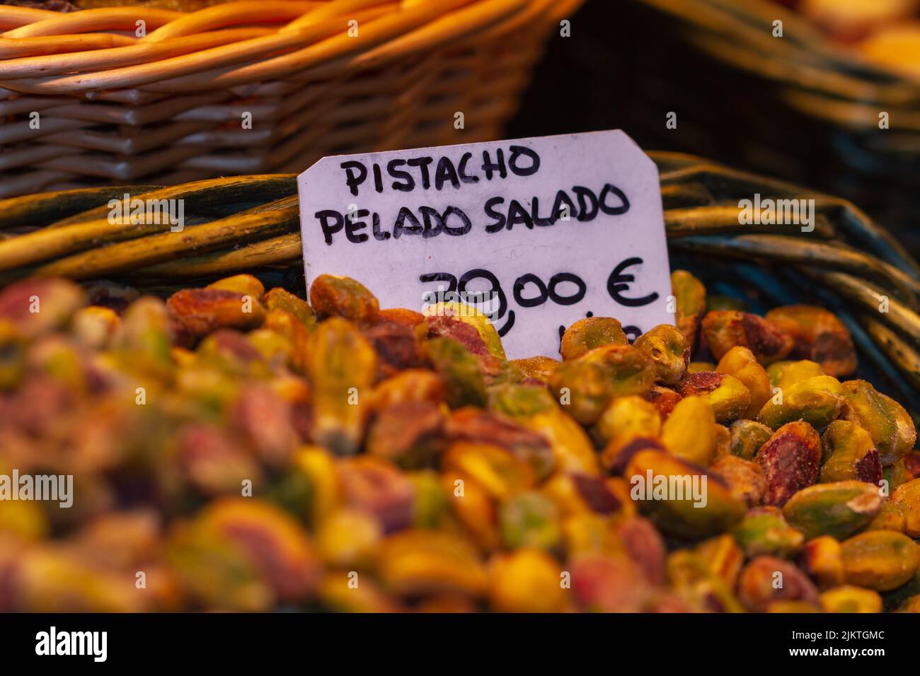 Nut store, bulk pistachio ready for sale, the sign translated into