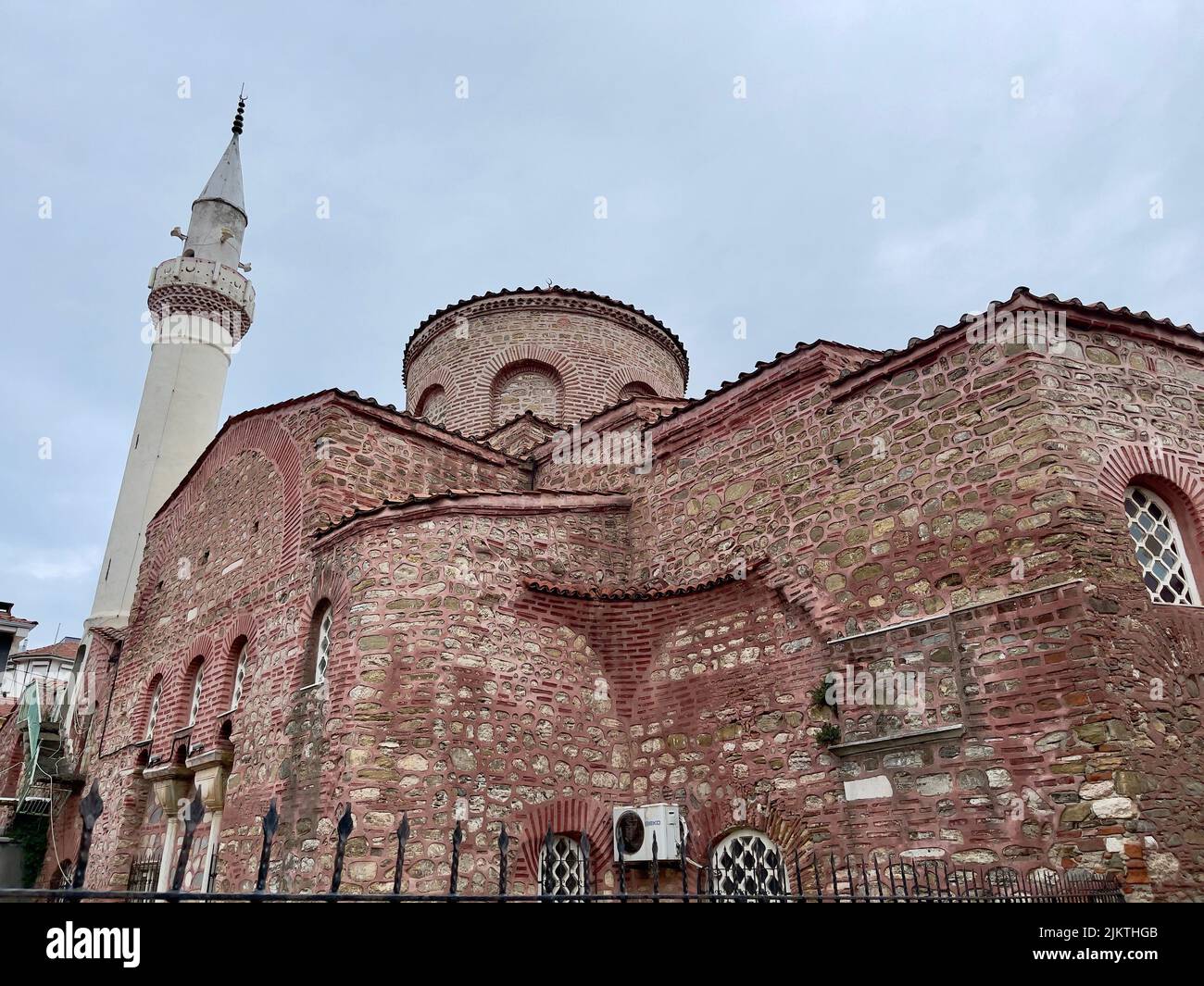 A low angle shot of the historic Trilye Fatih Mosque in Bursa, Turkey Stock Photo