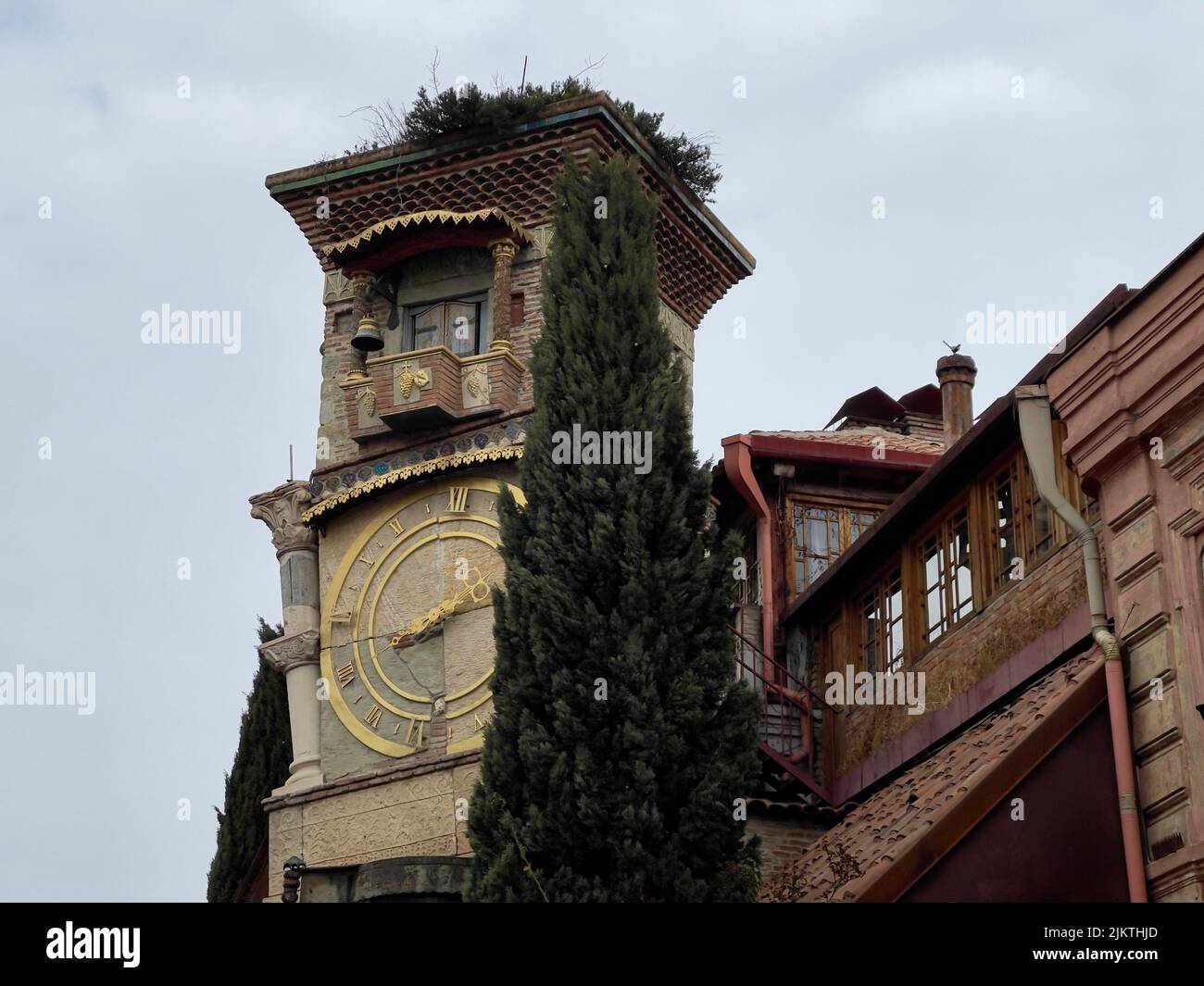 A low angle shot of the historic Tbilisi Clock Tower in Stock