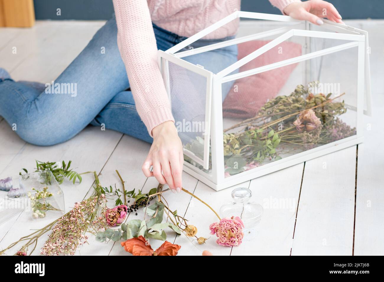 dried flower arrangement glass box room decor Stock Photo Alamy