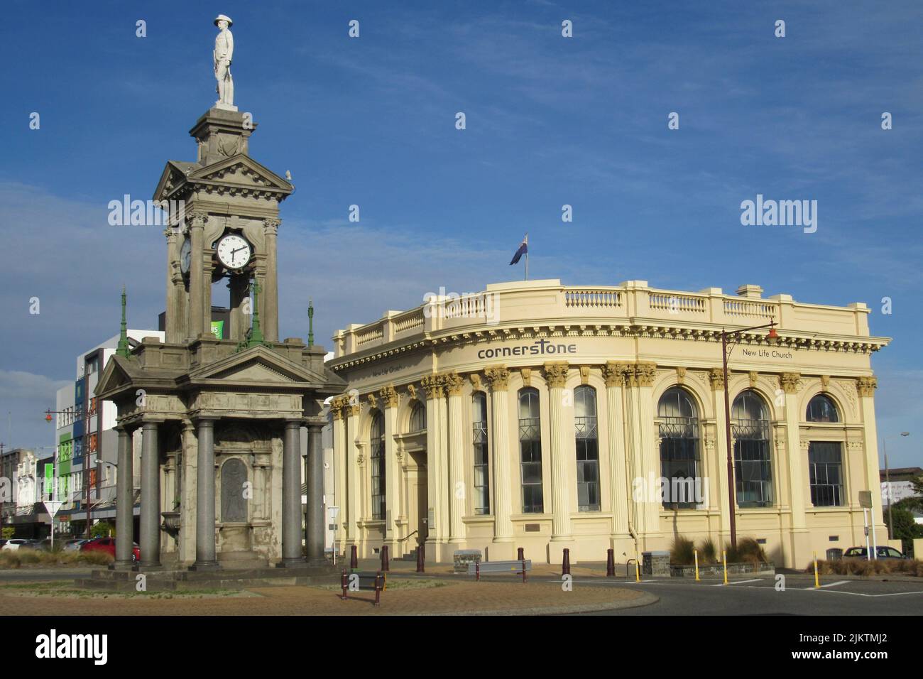 A view of a beautiful building and a clock tower in Invercargill, New Zealand on a sunny day Stock Photo