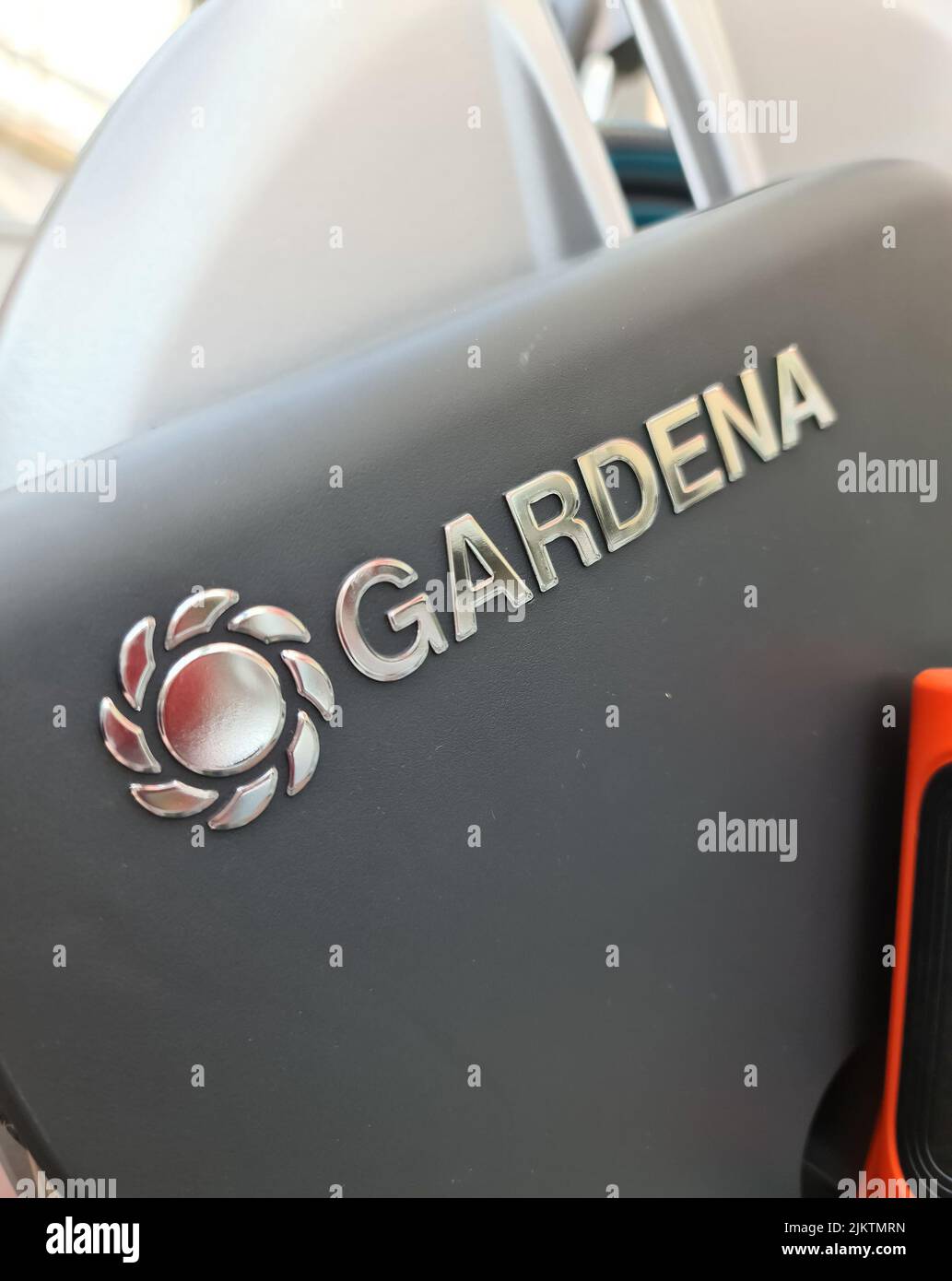 A vertical closeup logo of garden accessories company Gardena on the