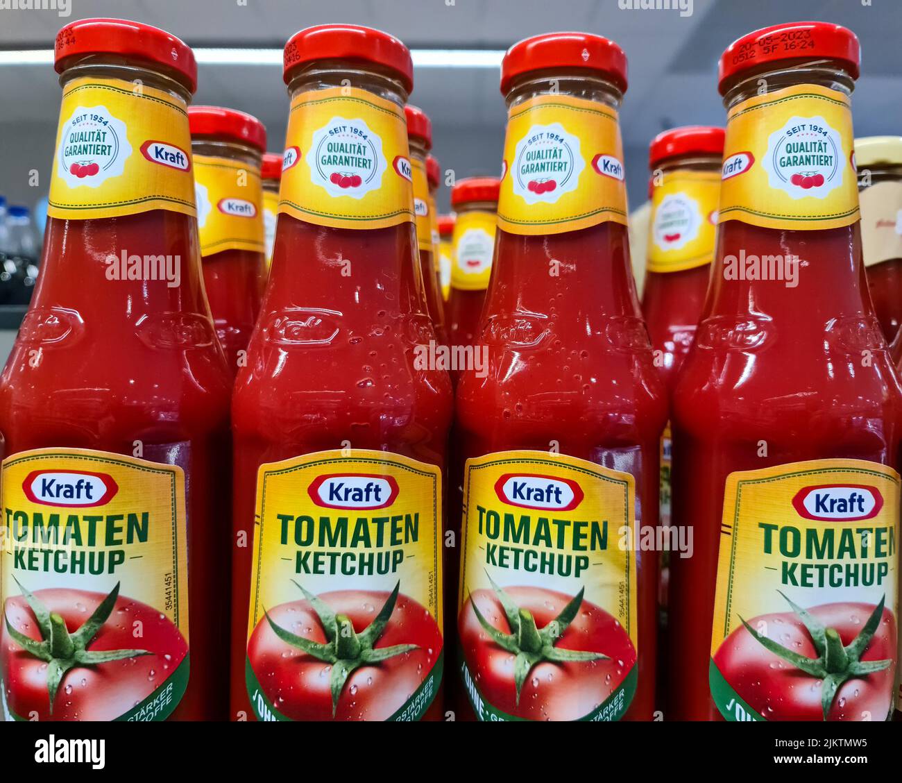 A closeup of bottles of tomato ketchup in a German supermarket Stock