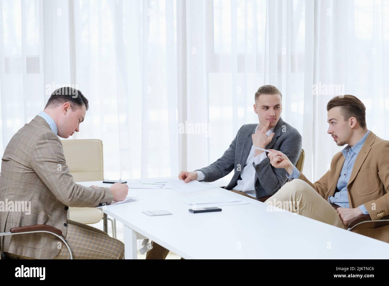 business meeting discussion team managers talking Stock Photo