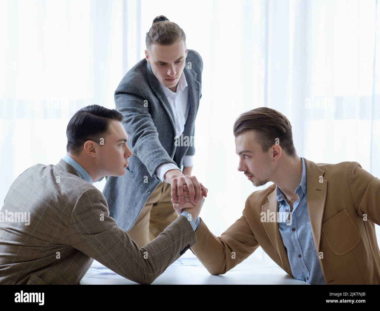 business competition arm wrestling focused men hands Stock Photo Alamy