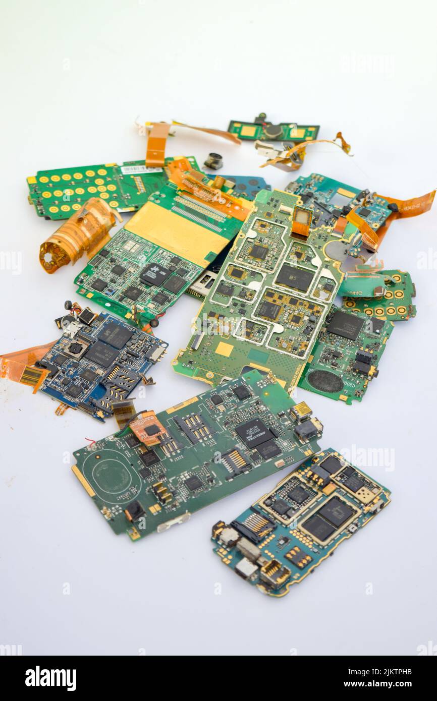 Mobile phone electronic waste containing gold metal Stock Photo
