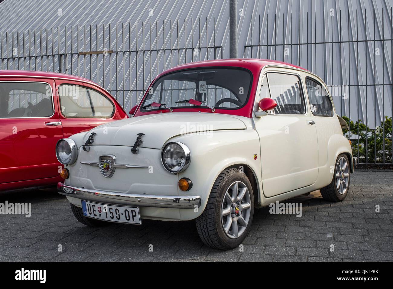 A beautiful shot of a white Fiat 600 on classical car exhibition Stock Photo