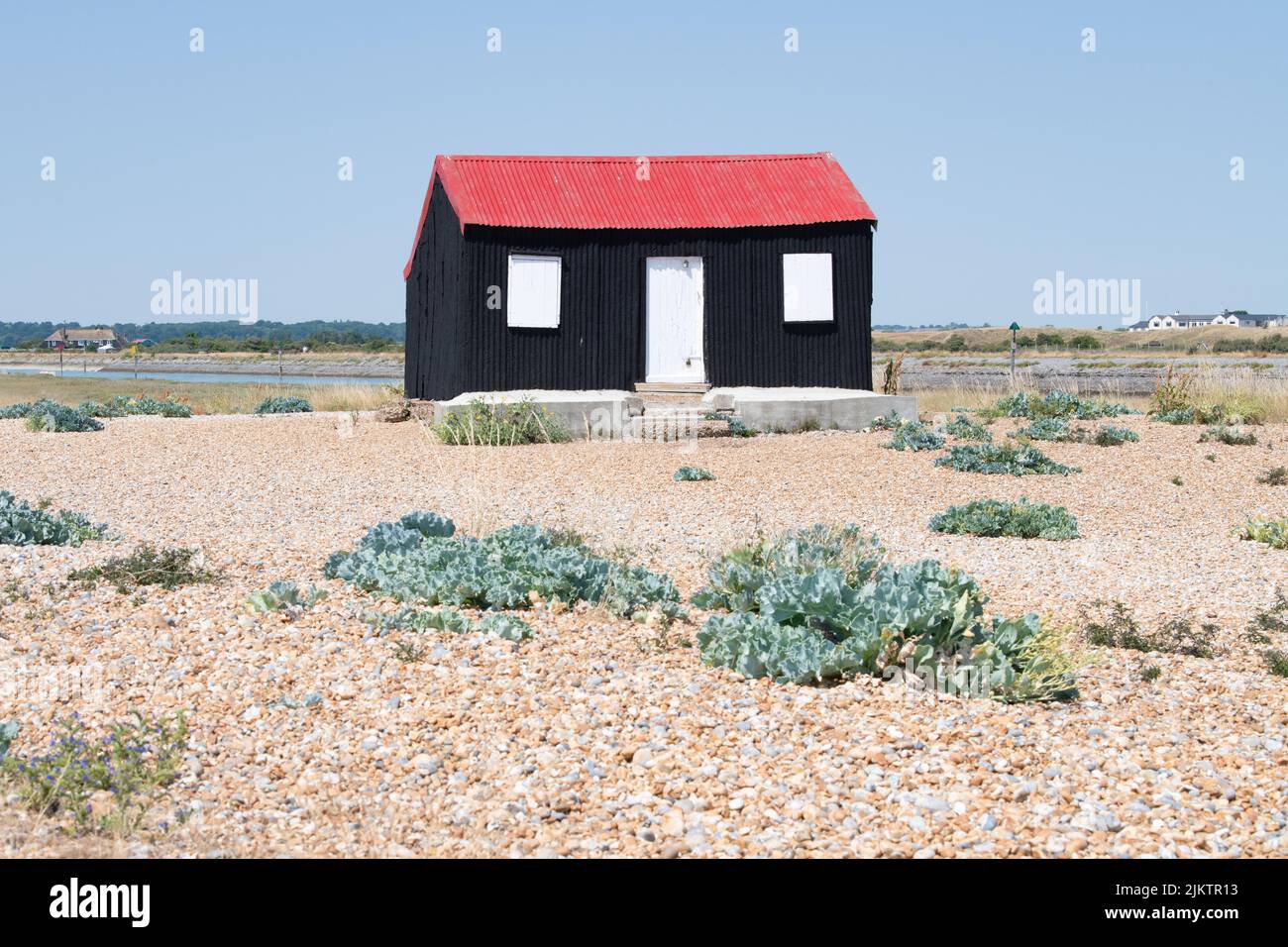 Red Roofed Hut at Rye Harbour Nature Reserve, Rye Harbour, Rye, East Sussex, England, UK Stock Photo