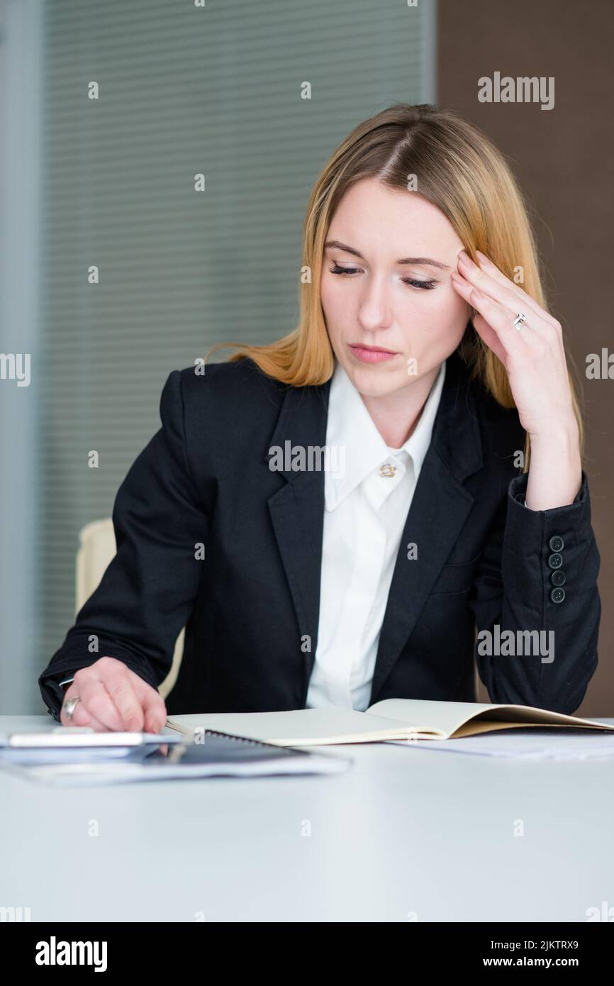 headache stress tiredness business lady work Stock Photo