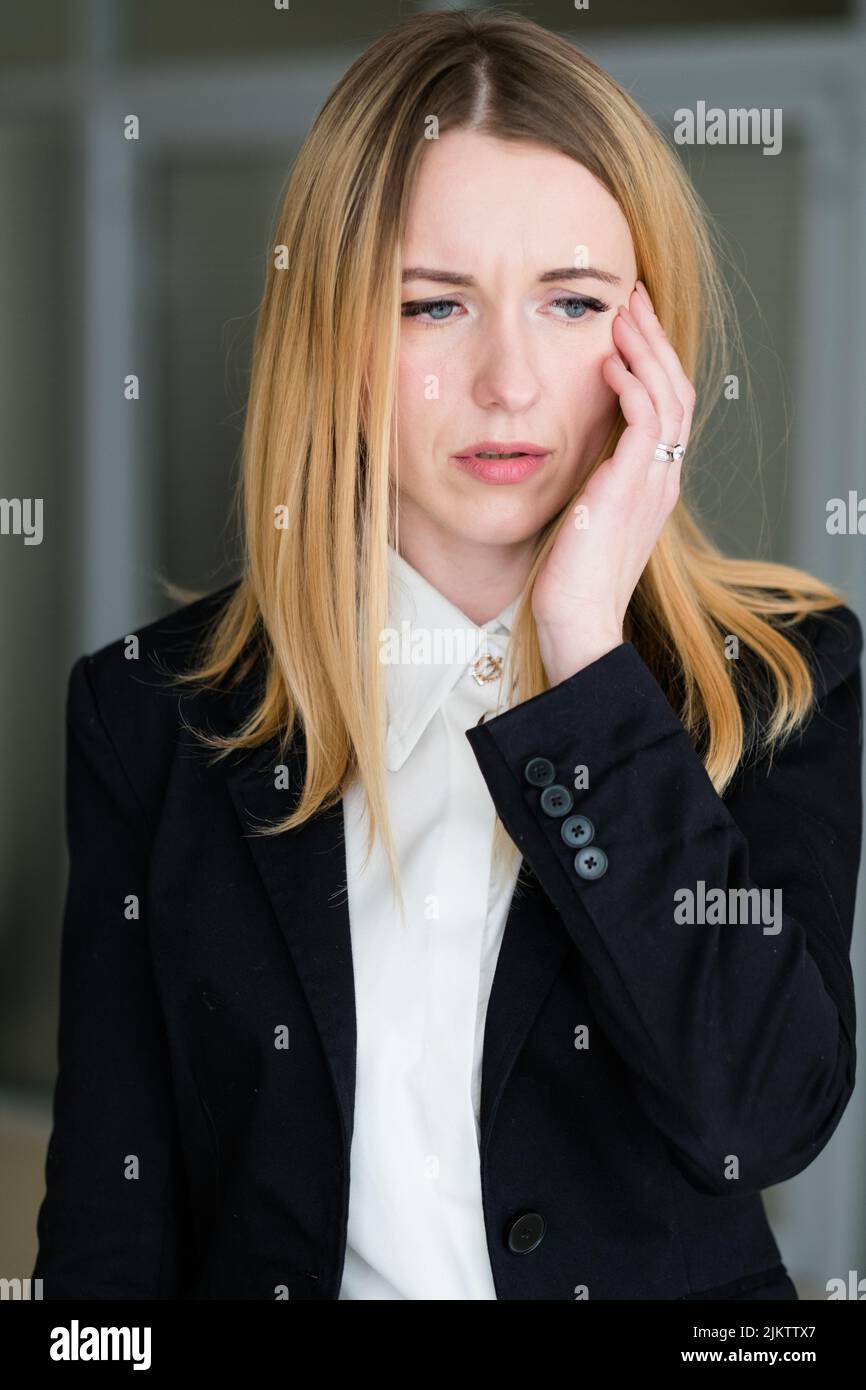 emotion upset disconcerted dismayed business woman Stock Photo