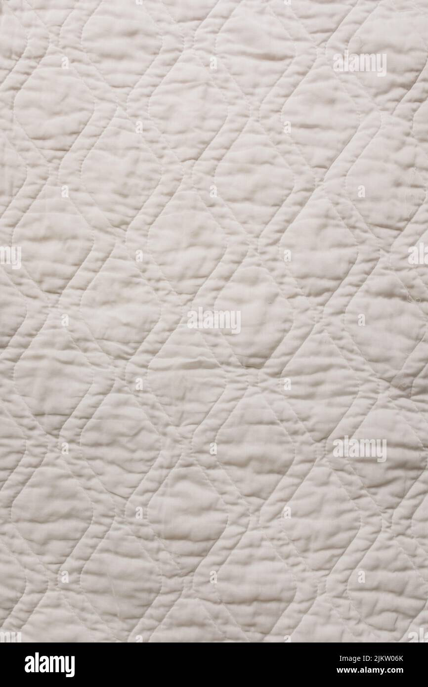 quilted diamond shape mattress pad cover, blanket, texture Stock Photo