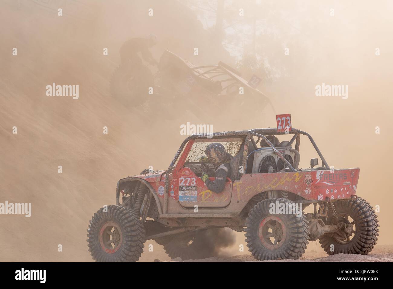 The driver with an offroad car during National All Terrain Championship Portugal with reduced visibility during the course Stock Photo