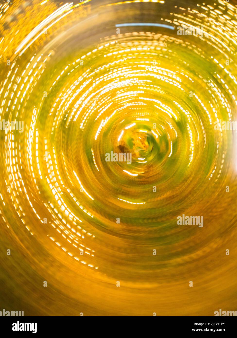 A blurred bokeh yellow and green background, wallpaper Stock Photo