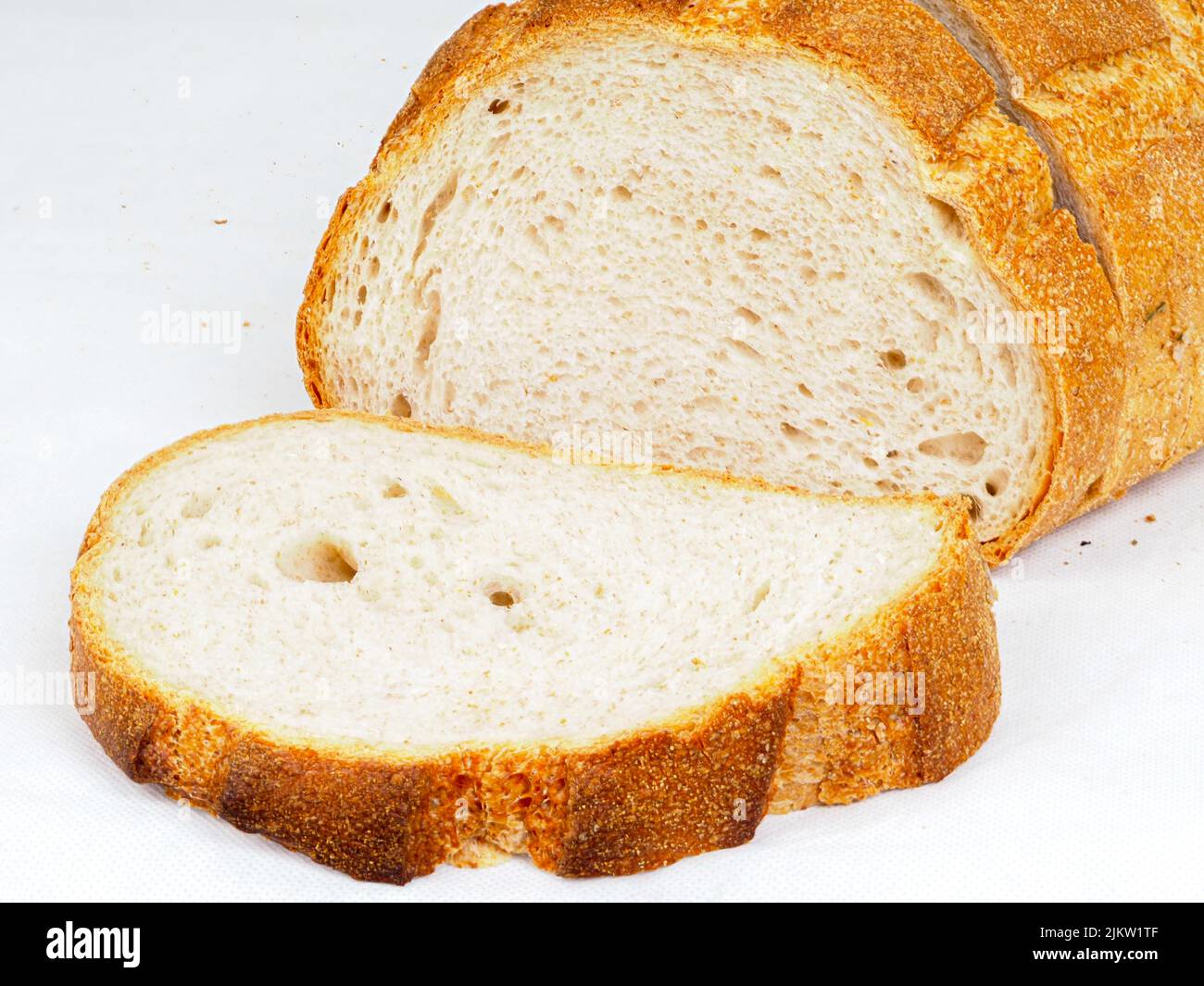 A sliced bread isolated on a white background Stock Photo - Alamy