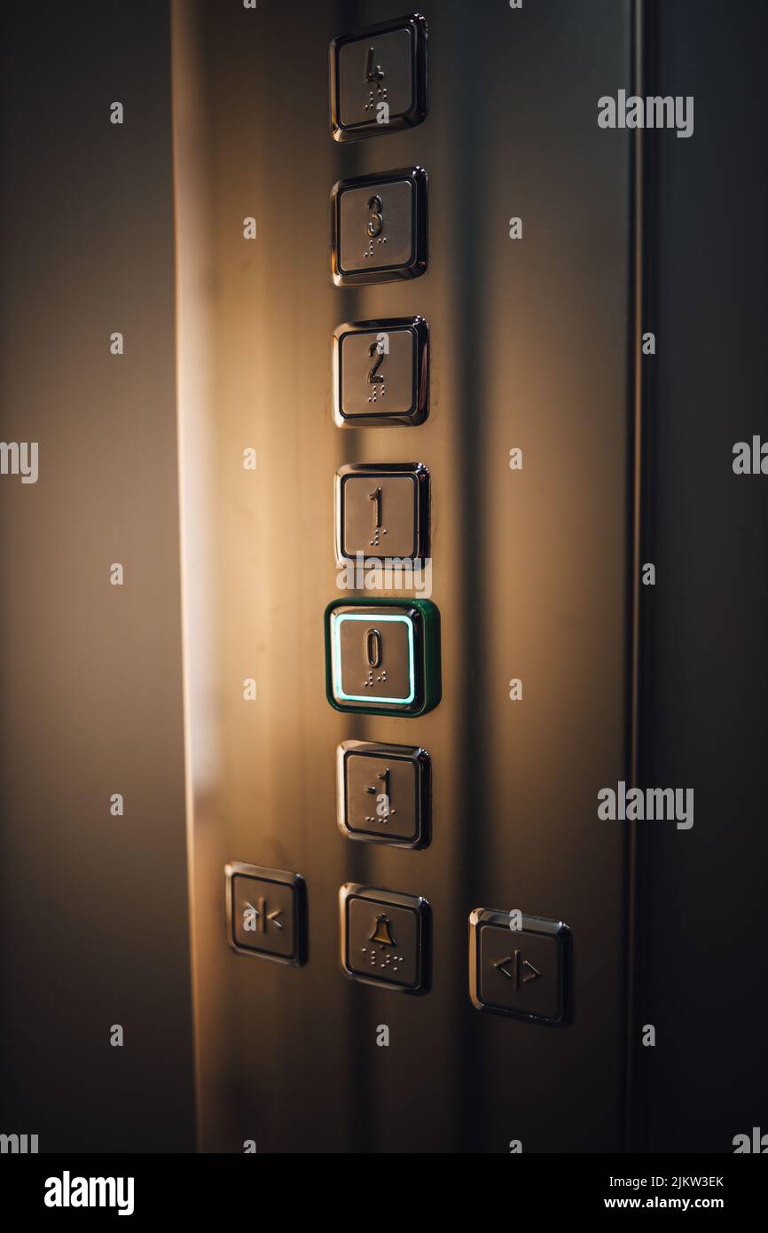 A vertical shot of the floors buttons inside modern elevator Stock Photo