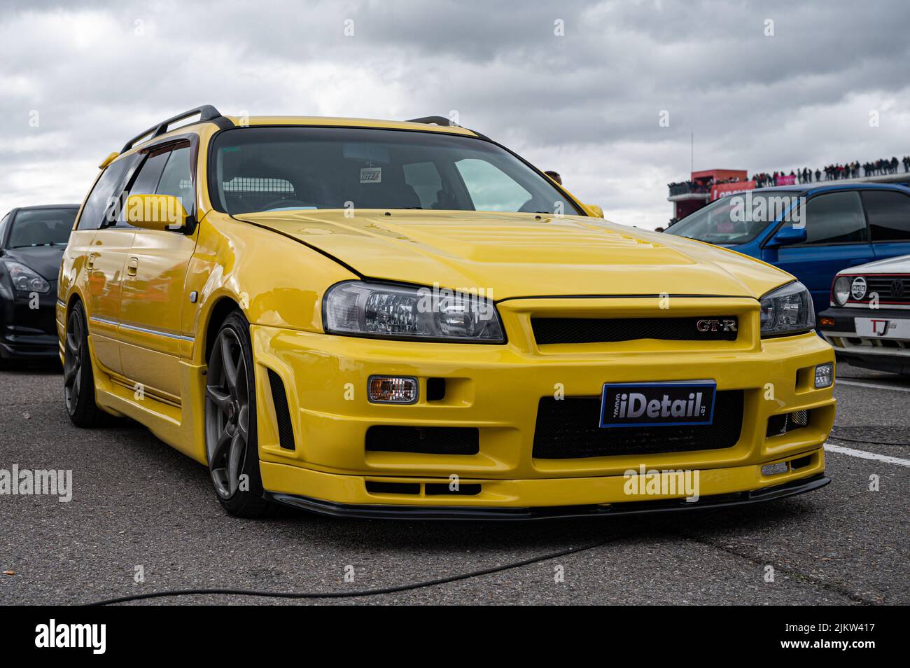 Navarre, Spain; March 6, 2022: Nice sports family car Nissan Stagea R34 GT-R Wagon in yellow color Stock Photo