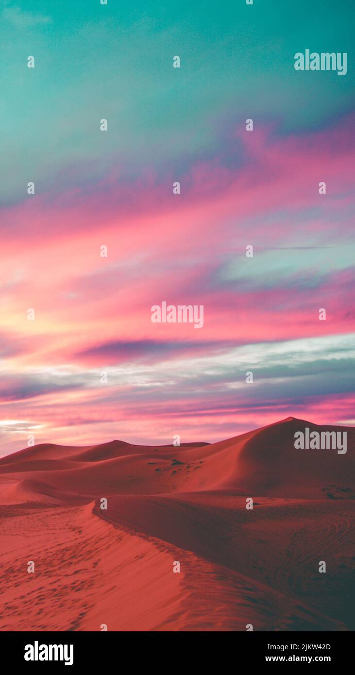 Sunset in the Sahara Desert sand dunes in Morocco, with an amazing sky ...