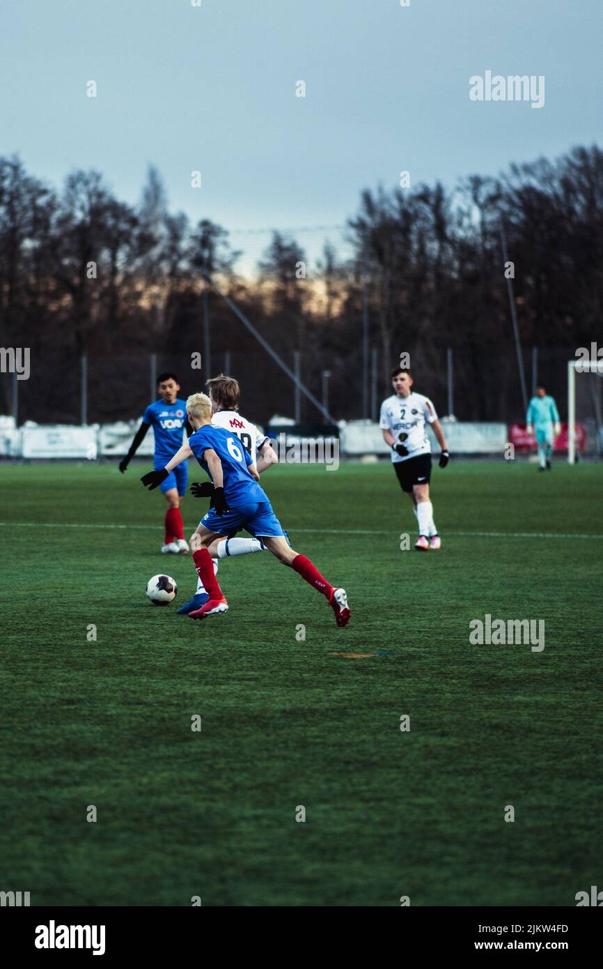 The Young footballers playing the match Karlslund vs Orebro in 2022 Stock Photo