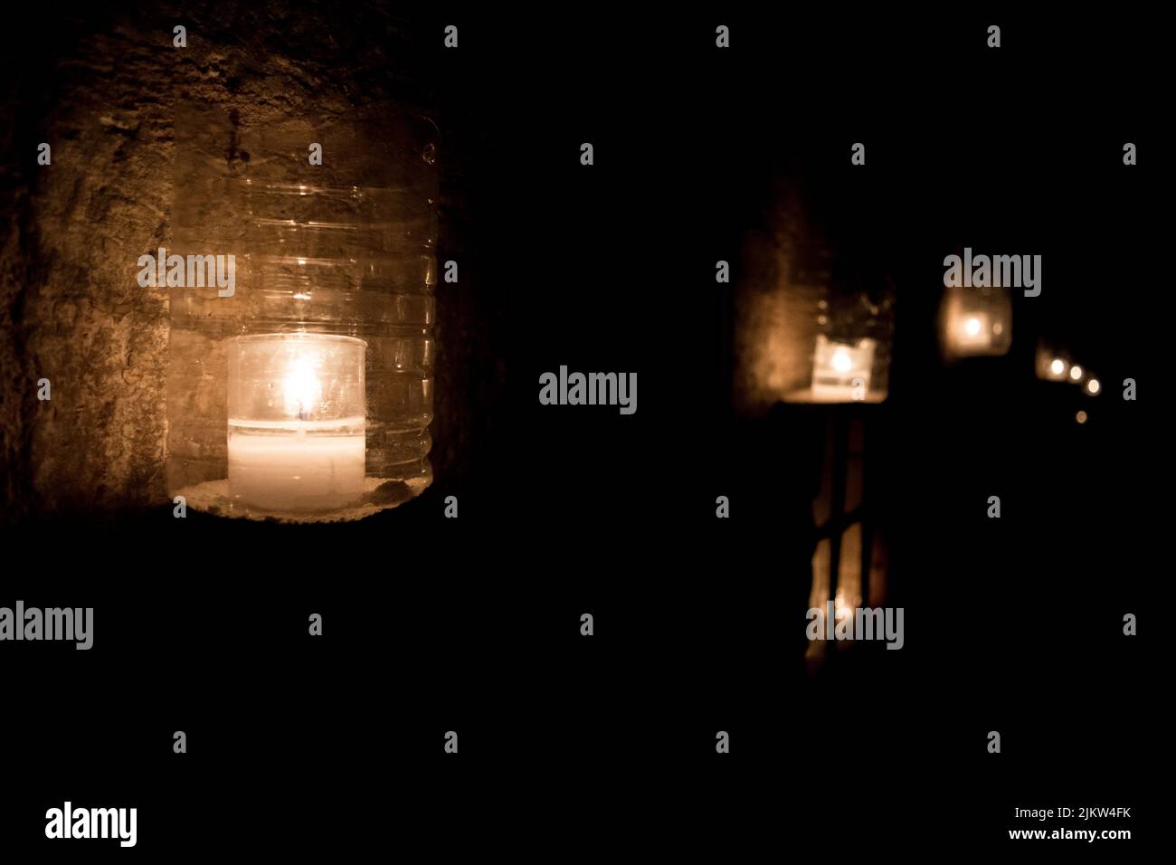 A creative lamp, made out of recycled plastic bottles and lit up with